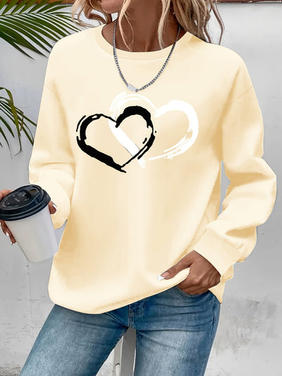 Sweatshirt med hjärttryck – Lekfull komfort med kärleksfull stil